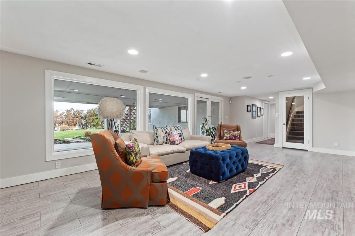4814 Roberts Road Boise, ID 83705 - Photo 29 of 50 Living area with stairs, recessed lighting, and wood tiled floors