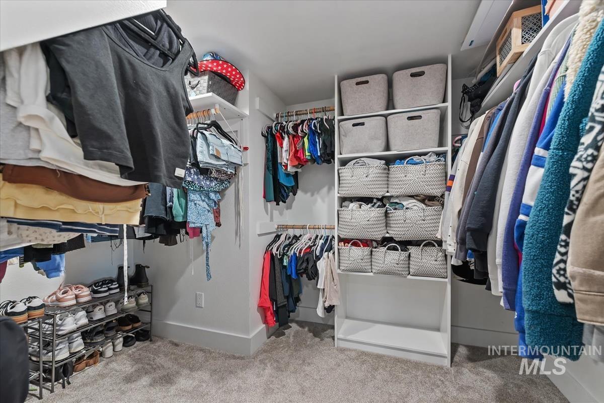 4814 Roberts Road Boise, ID 83705 - Photo 37 of 50 Walk in closet with light colored carpet