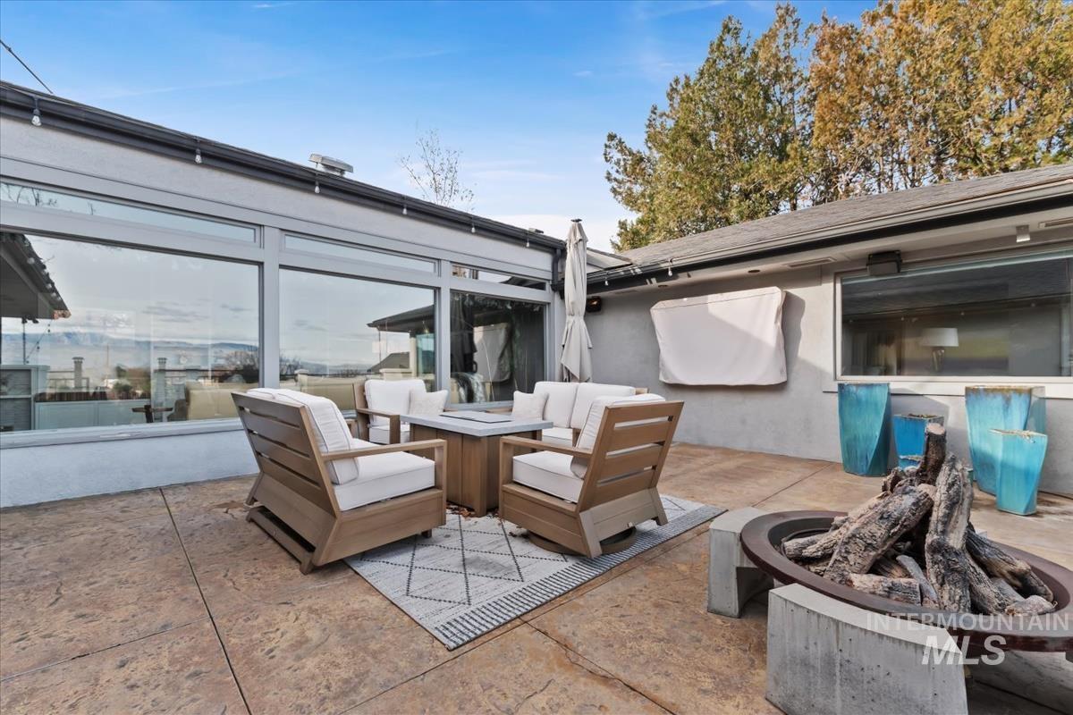 4814 Roberts Road Boise, ID 83705 - Photo 40 of 50 View of patio featuring an outdoor living space with a fire pit