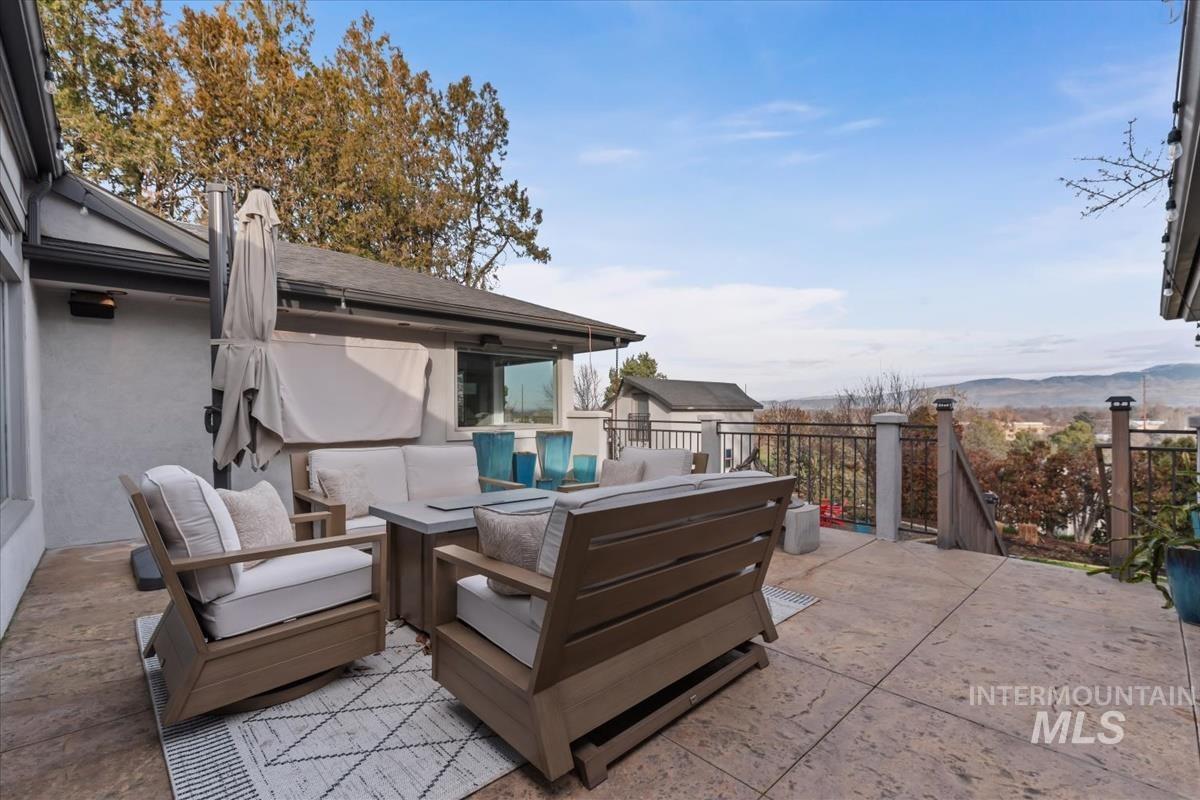 4814 Roberts Road Boise, ID 83705 - Photo 46 of 50 View of patio with an outdoor living space and a mountain view