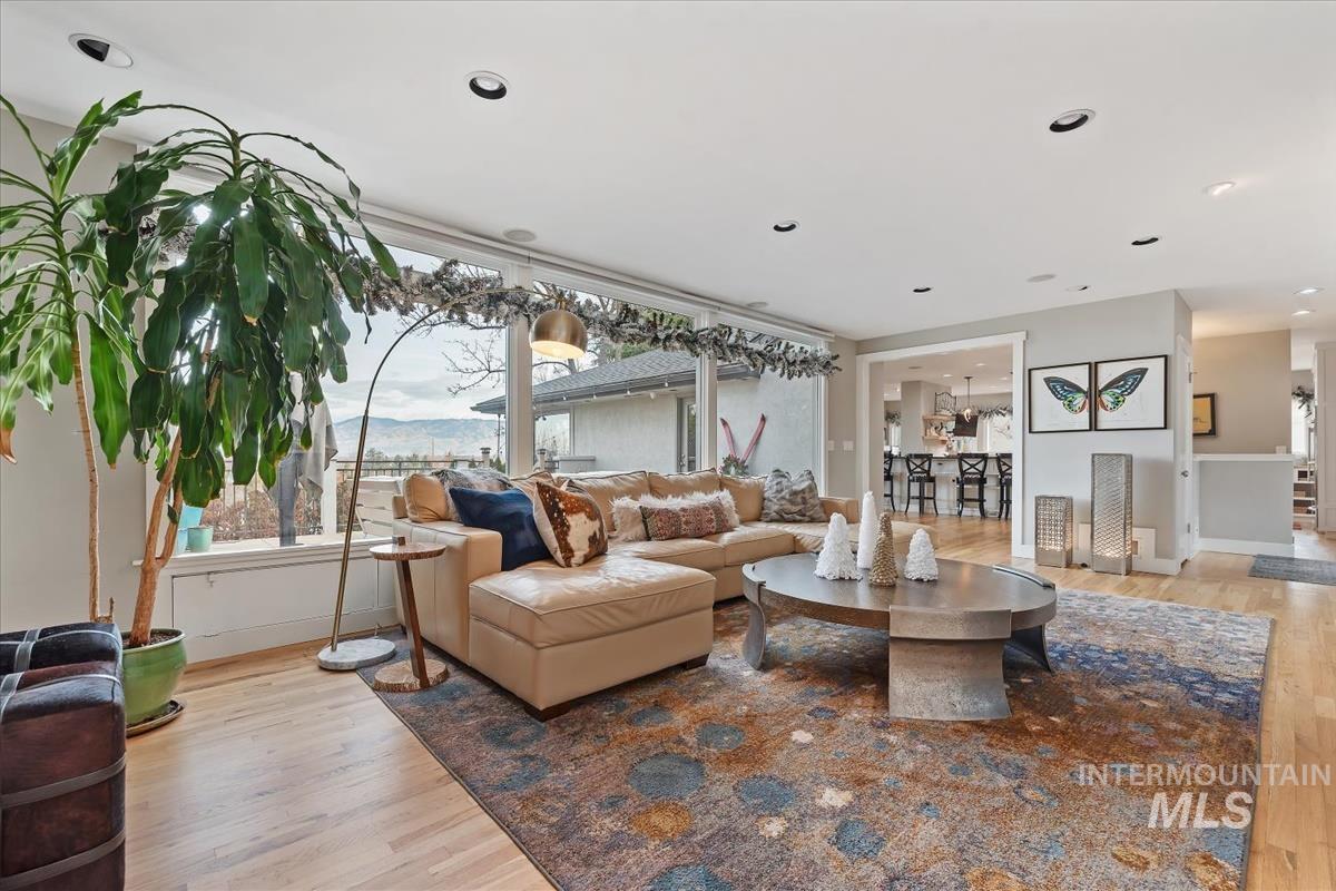 4814 Roberts Road Boise, ID 83705 - Photo 6 of 50 Living room with light wood-style floors and baseboards