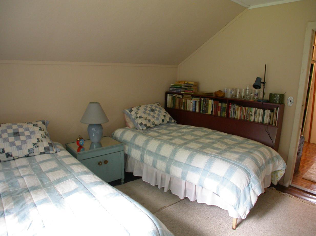 231 Sandisfield Road Sandisfield, MA 01255 - Photo 5 of 12 a bedroom with a bed and a window