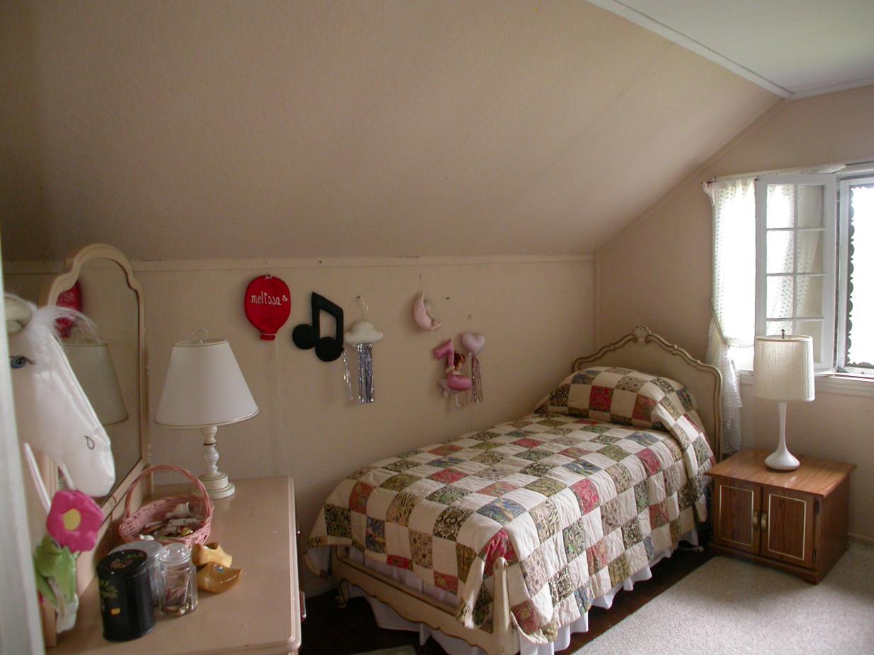 231 Sandisfield Road Sandisfield, MA 01255 - Photo 6 of 12 a bedroom with a bed and a dresser