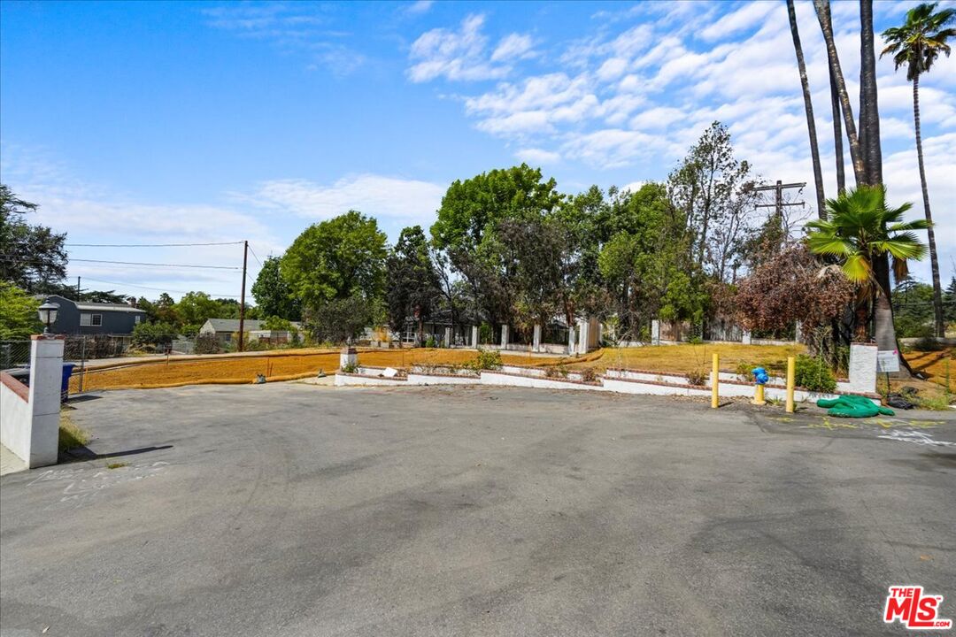 672 Colman Street Altadena, CA 91001 - Photo 3 of 6 a view of swimming pool with lawn chairs under an umbrella