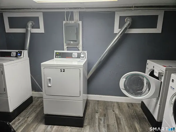 a utility room with dryer and washer