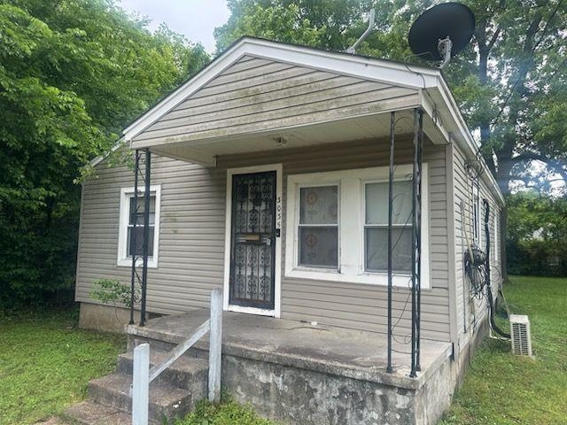 3035 Mt Olive Road Memphis, TN 38108 - Photo 1 of 13 Single-story residence featuring horizontal vinyl siding and a covered front porch