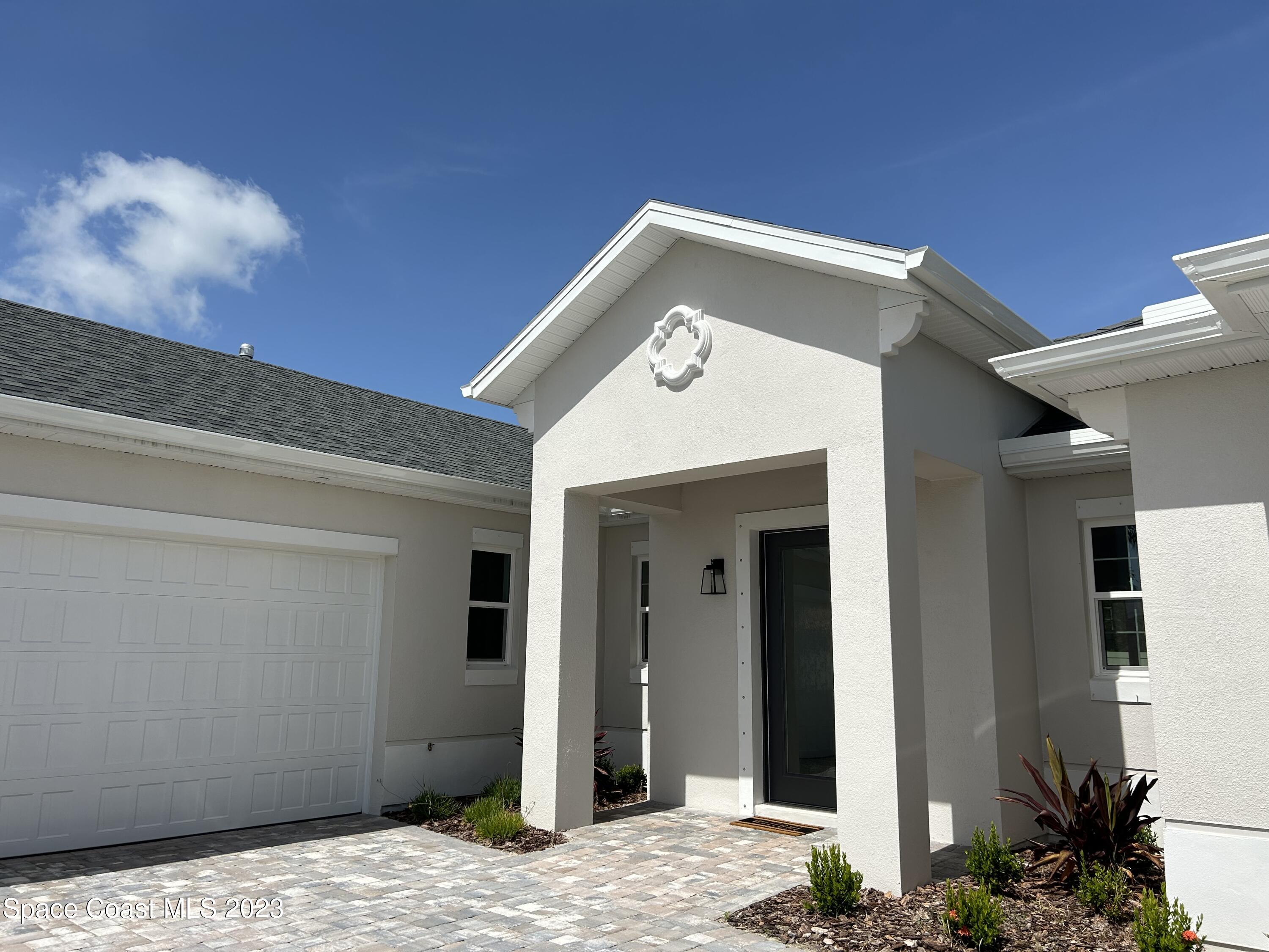 4095 Negal Circle Melbourne, FL 32901 - Photo 12 of 20 a view of a door of the house