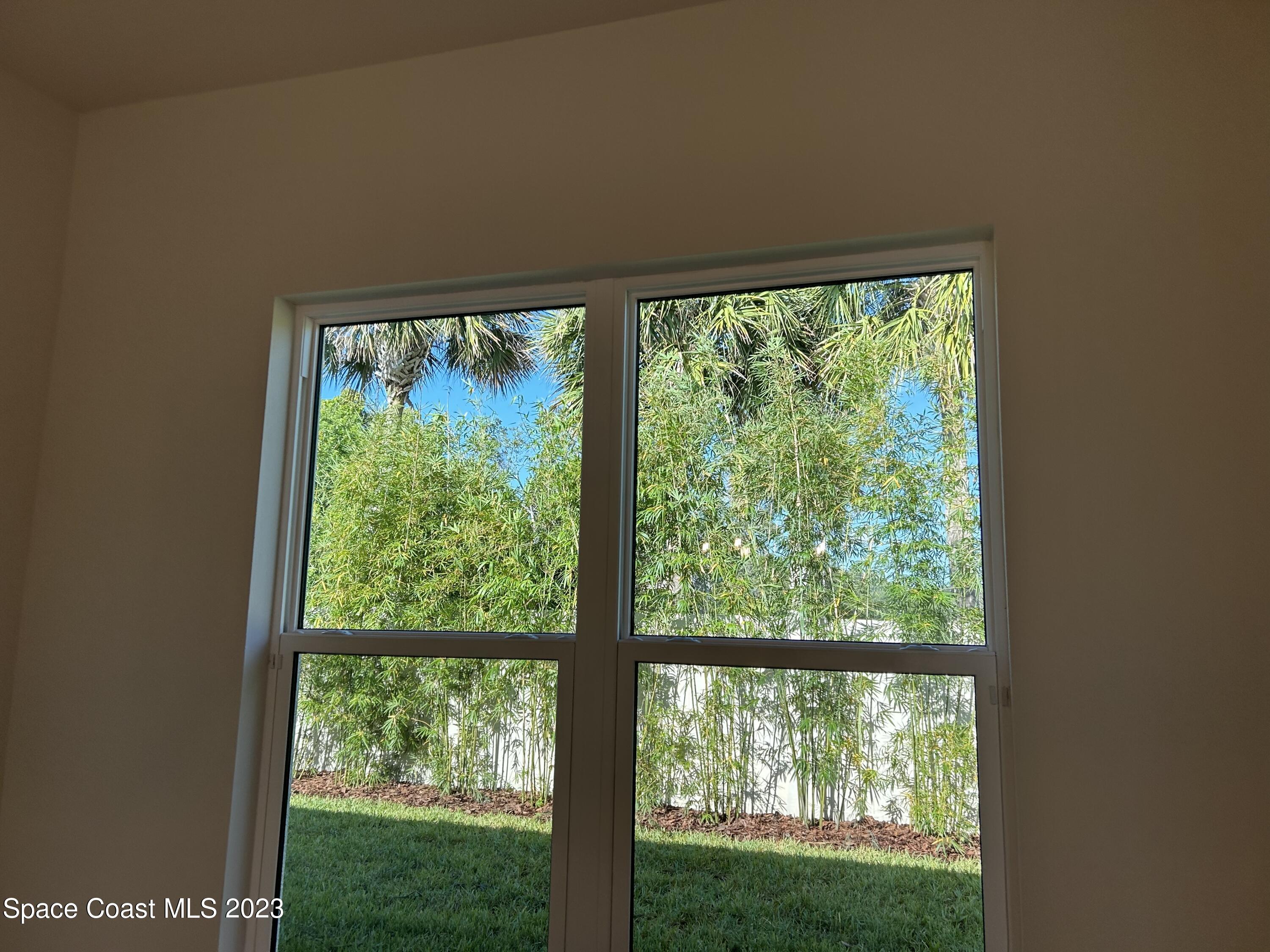 4095 Negal Circle Melbourne, FL 32901 - Photo 15 of 20 a window with an outdoor space