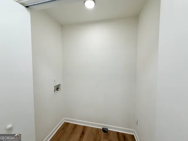 a view of small space with racks on the wall