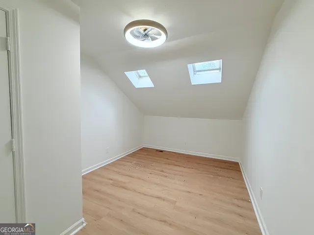 a view of a room with a fan