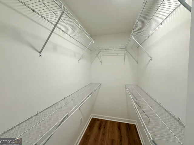 a view of a room with racks on the wall