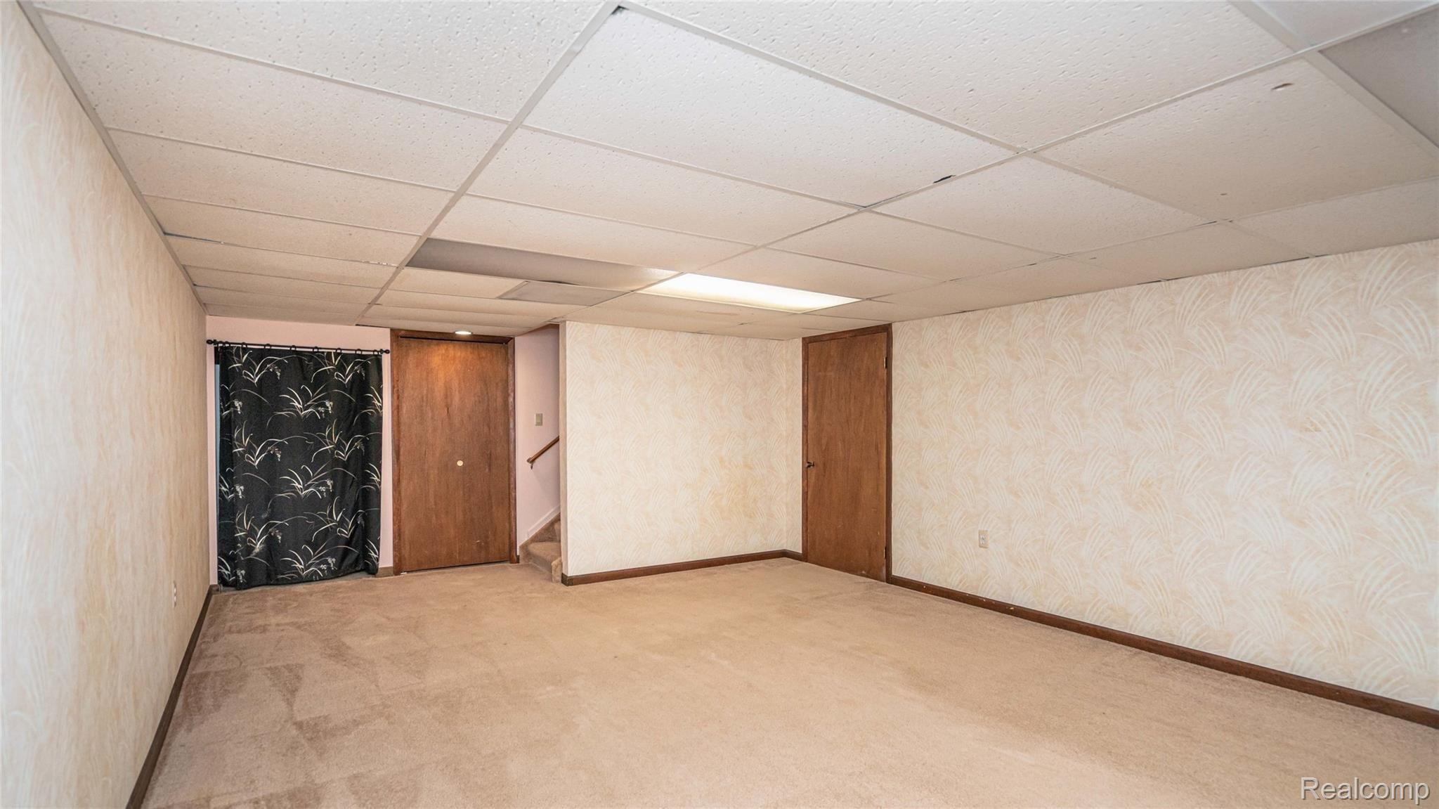 5330 Inverrary Lane Commerce Township, MI 48382 - Photo 72 of 76 Drop ceiling in finished portion of basement.