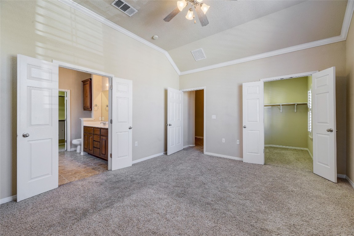 14100 Avery Ranch Boulevard, Unit 701 Austin, TX 78717 - Photo 1 of 1 an empty room with fan and entrance