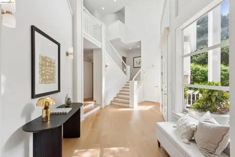 a view of a livingroom with furniture and front door