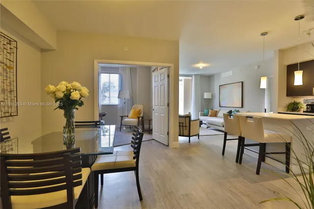 a living room with furniture and a table