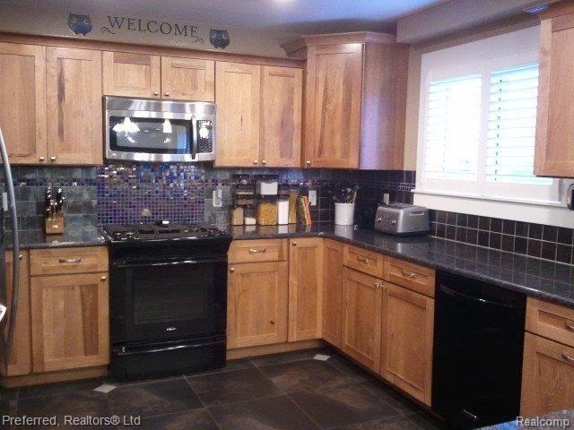 42544 Saltz Road Canton, MI 48187 - Photo 3 of 21 Kitchen with granite counters