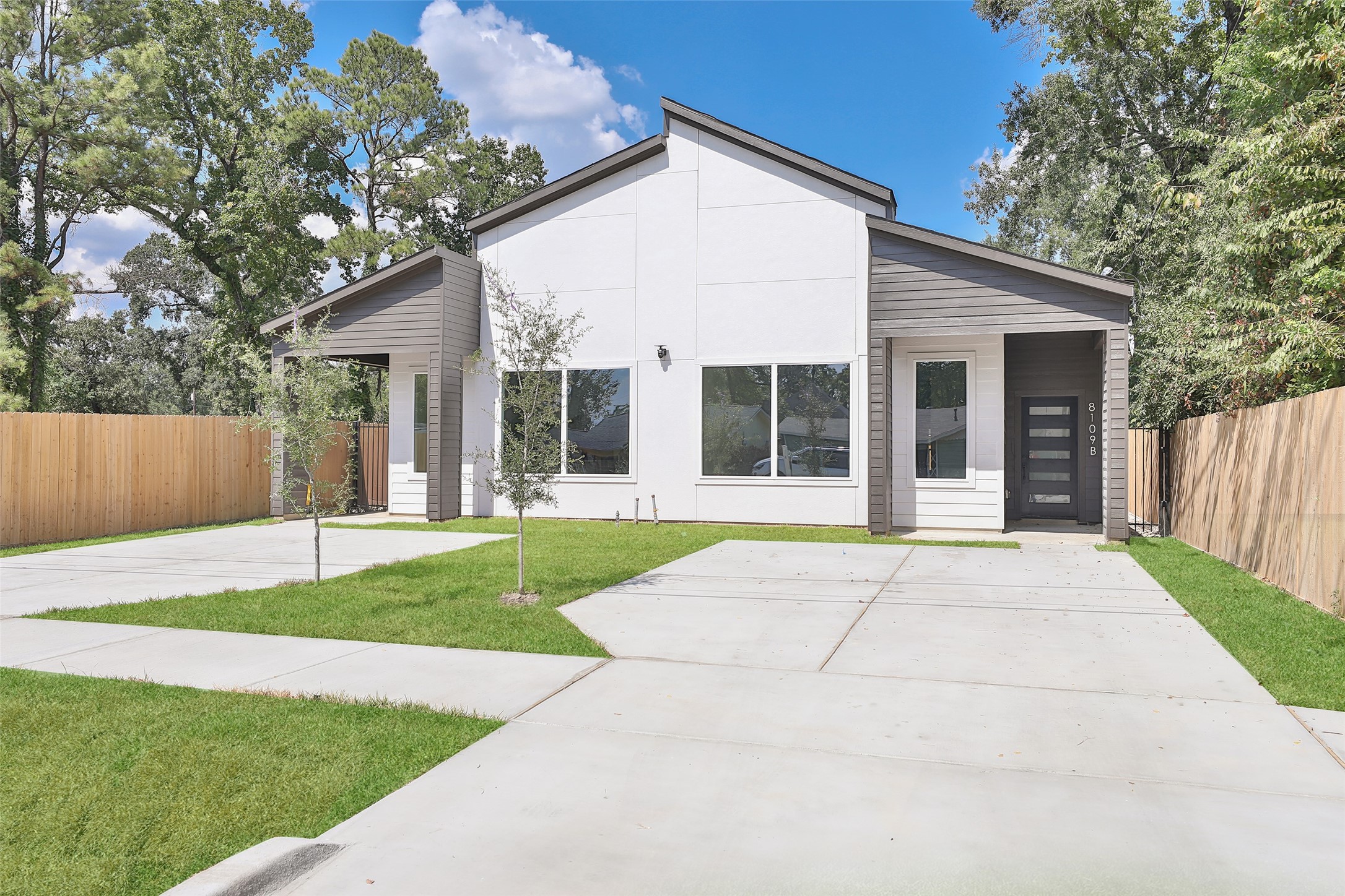 8109 Cabot Street, Unit A/B Houston, TX 77078 - Photo 2 of 33 a view of a house with a yard and large tree