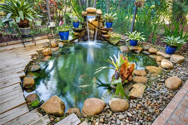 a utility room with sink dryer and washer