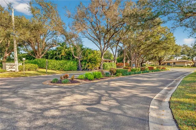 an aerial view of a houses and trees