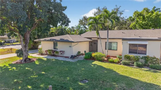 an aerial view of a house with a garden
