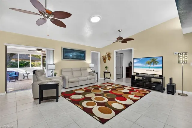 a bedroom with a bed and dresser