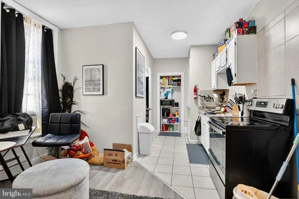 a living room with furniture fireplace and a flat screen tv