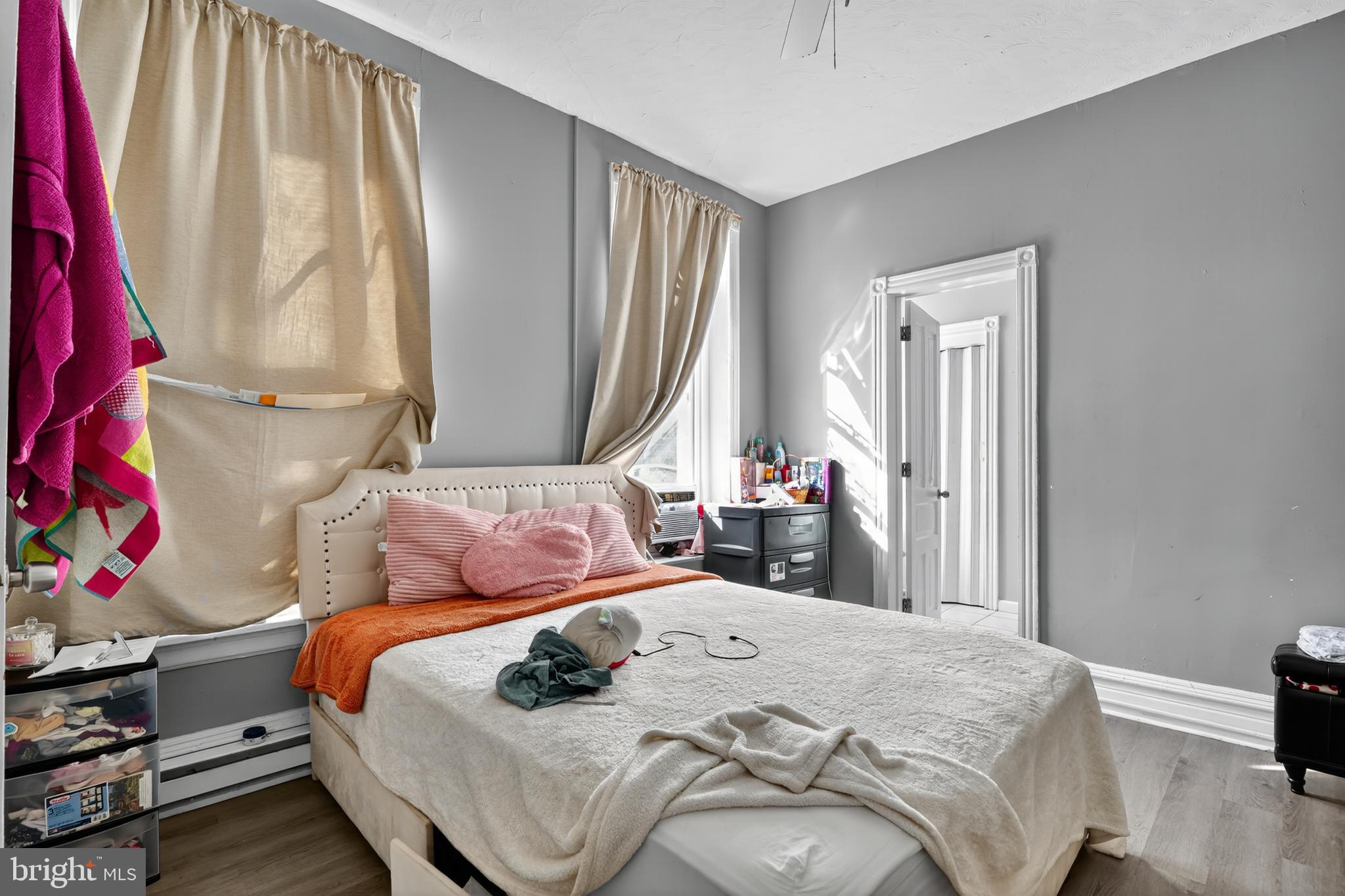 1259 North 10th Street Reading, PA 19604 - Photo 21 of 36 a bedroom with a bed and a window