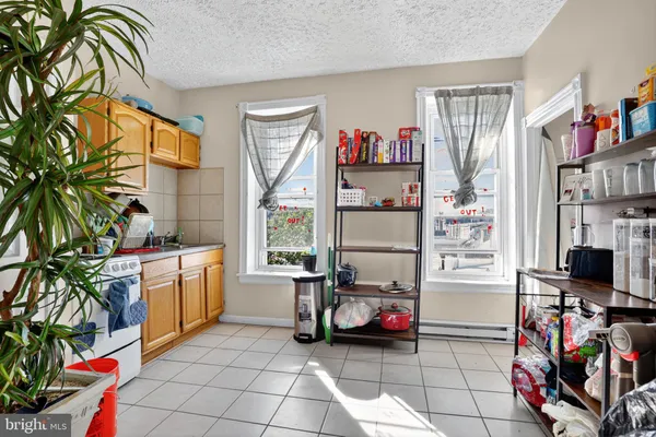 a view of a room with storage and utility room