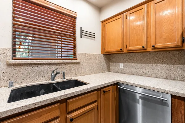 a kitchen with a stove and a microwave