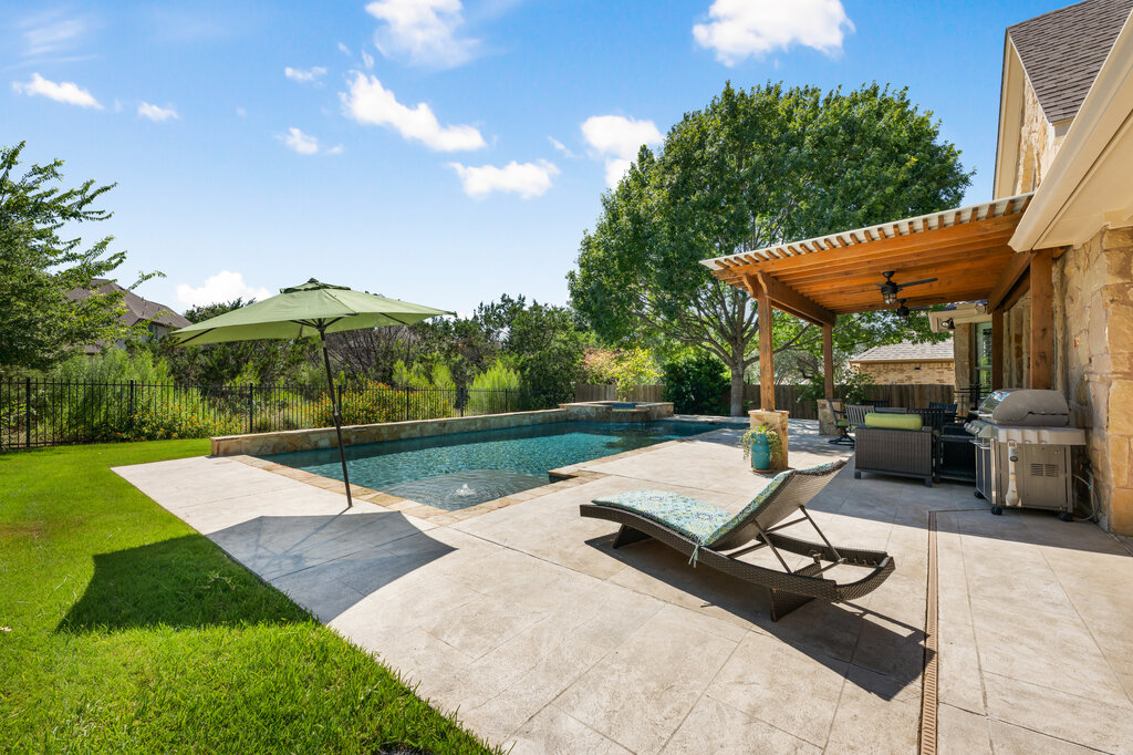 12801 Little Dipper Path Austin, TX 78732 - Photo 27 of 29 a view of a backyard with sitting area