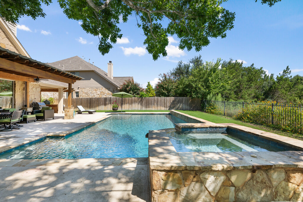 12801 Little Dipper Path Austin, TX 78732 - Photo 28 of 29 a view of a swimming pool with a patio