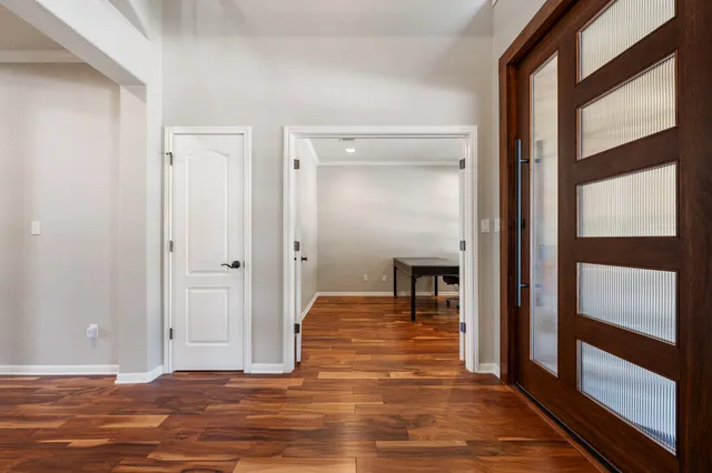 a view of livingroom with hardwood floor and hallway