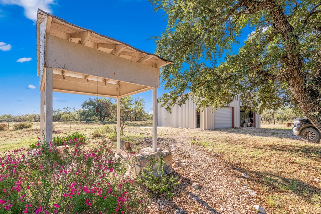 4980 West Ranch Road 1674 Junction, TX 76849 - Photo 15 of 23 a view of a house with a yard