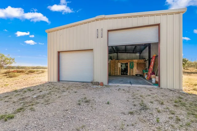 a front view of a house with a patio