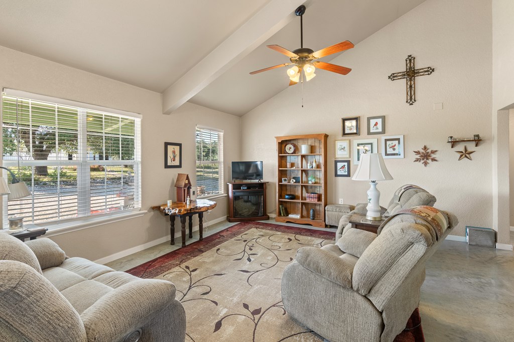 4980 West Ranch Road 1674 Junction, TX 76849 - Photo 5 of 23 a living room with furniture a chandelier and a window