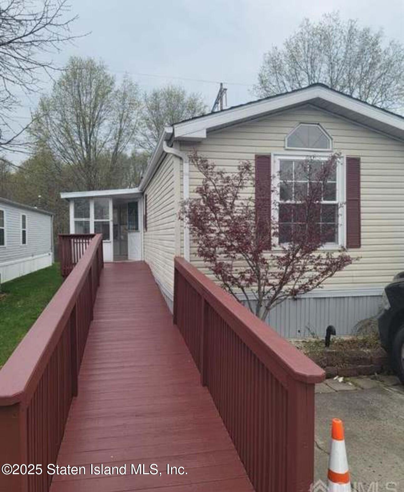 15 Twain Road New Brunswick, NJ 08902 - Photo 1 of 1 a view of a house with wooden deck