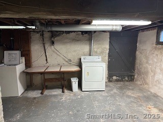 70 Thorpe Street, Unit 72 Fairfield, CT 06824 - Photo 21 of 21 Huge private basement with washer-dryer and walk out to back yard.