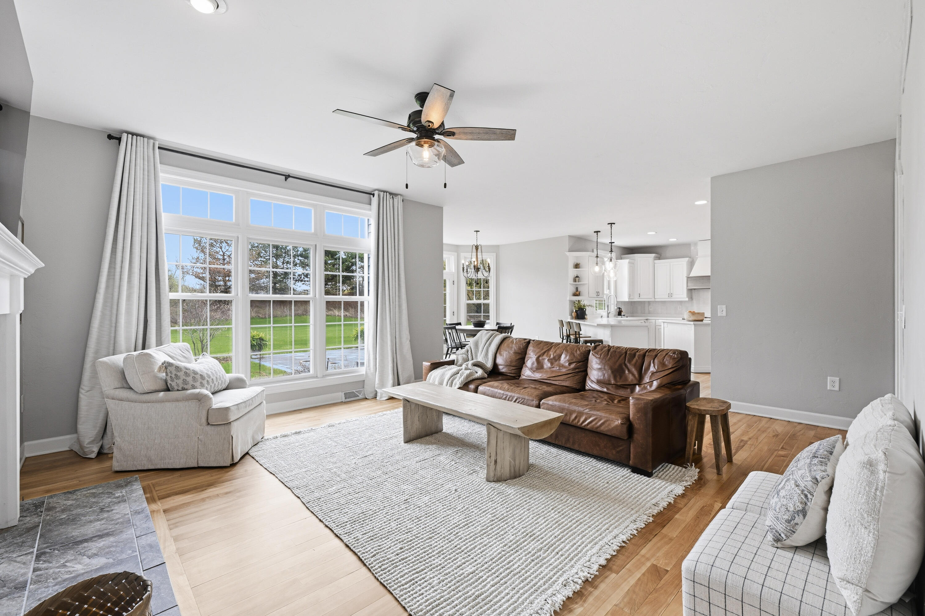 W223N3589 Ridgeside Court Pewaukee, WI 53072 - Photo 11 of 42 Gas Fireplace, natural wood floors!