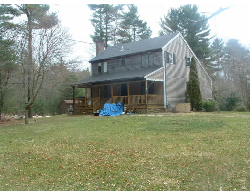 115 High Street Carver, MA 02330 - Photo 1 of 8 a view of a house with a backyard