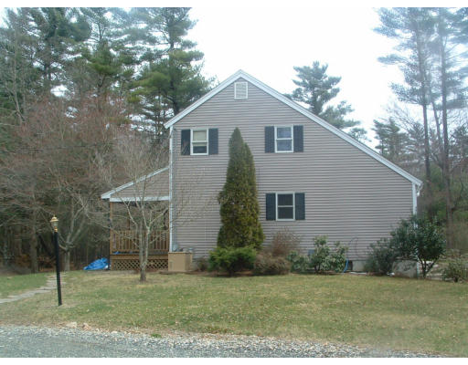 115 High Street Carver, MA 02330 - Photo 2 of 8 a front view of a house with a yard