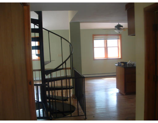 115 High Street Carver, MA 02330 - Photo 5 of 8 a view of entryway and hall with wooden floor