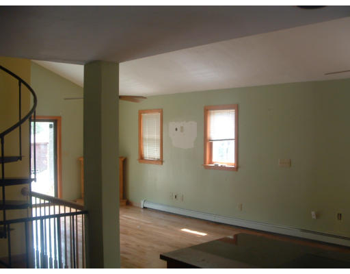 115 High Street Carver, MA 02330 - Photo 8 of 8 a view of an empty room with a window