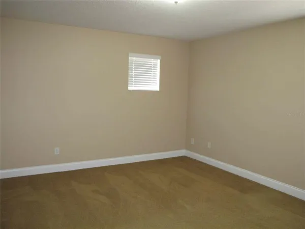 a view of small space with racks on the wall