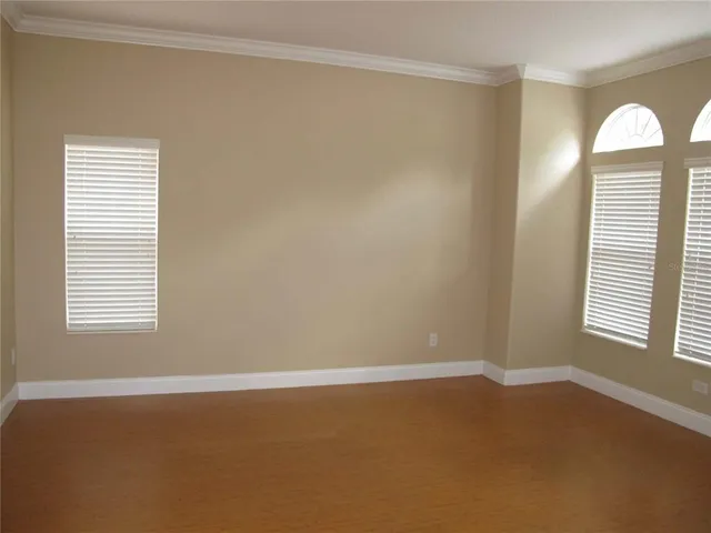 a view of a room that has a window in it