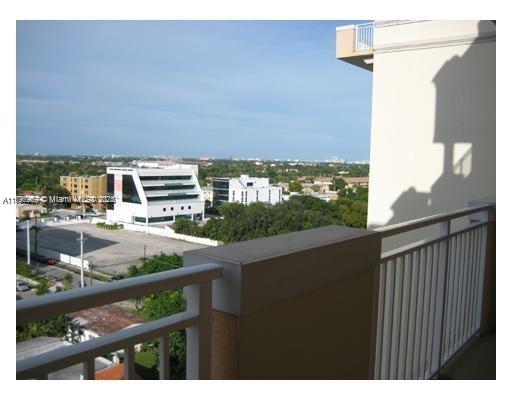 215 Southwest 42nd Avenue, Unit 905 Miami, FL 33134 - Photo 4 of 18 a balcony with a city view
