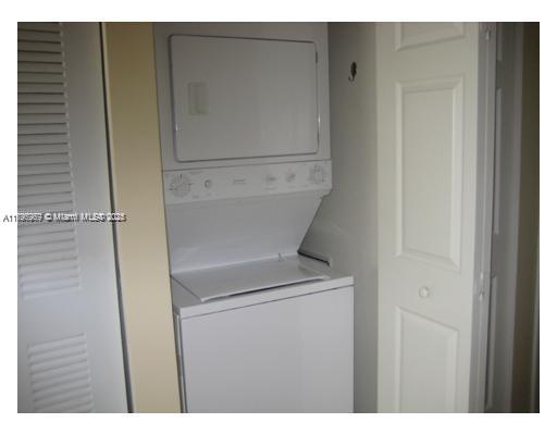 215 Southwest 42nd Avenue, Unit 905 Miami, FL 33134 - Photo 10 of 18 a utility room with a sink