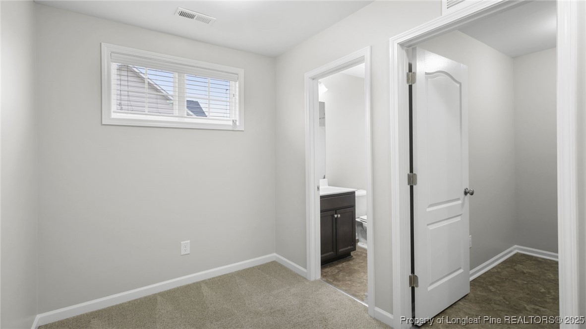 160 Chatfield Dr. Raeford, NC 28376 - Photo 18 of 32 an empty room and closet area