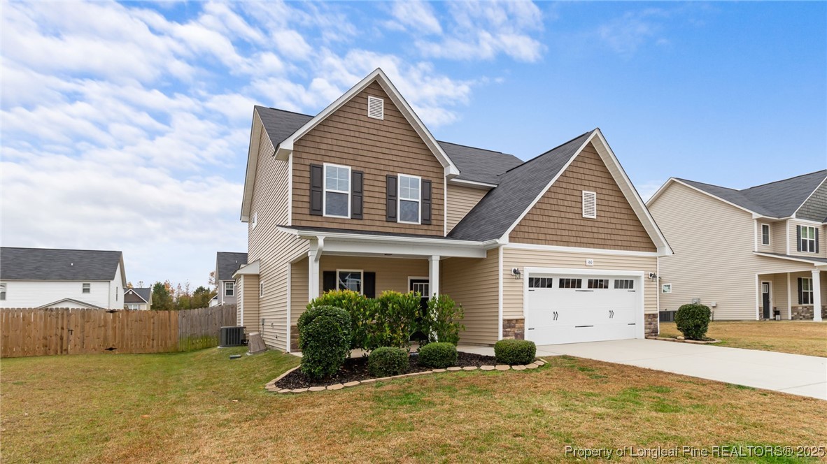 160 Chatfield Dr. Raeford, NC 28376 - Photo 2 of 32 a front view of a house with a yard