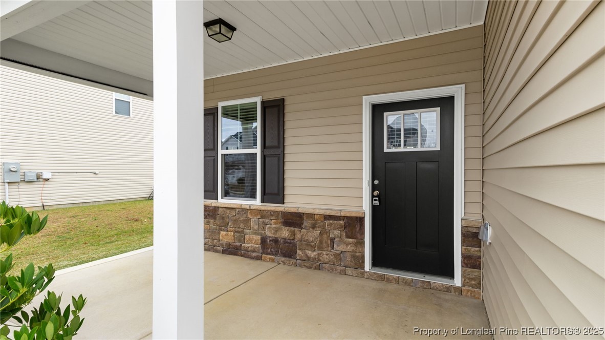 160 Chatfield Dr. Raeford, NC 28376 - Photo 4 of 32 a view of a house with a outdoor space