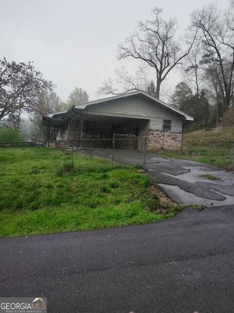 46 Mohawk Trail Ringgold, GA 30736 - Photo 2 of 16 a front view of a house with garden